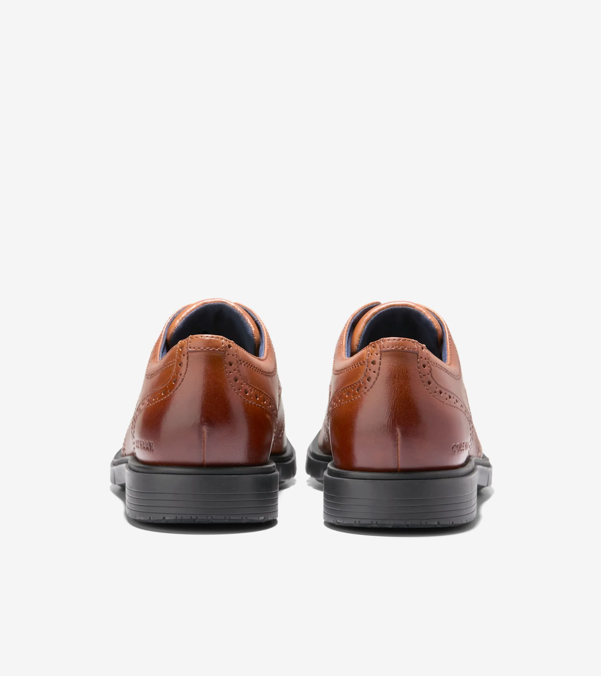 კაცის GrandFlex Dress Wingtip Oxfords